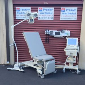 Exam Tables for Sale MPI Model 8087 with New Graphite Upholstery and Stir ups Power Up and Tilt