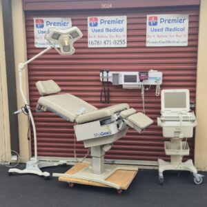 Exam Table Chairs for Sale Electric Hydraulic UMF 5020 with Original Creme Upholstery & Hand Control